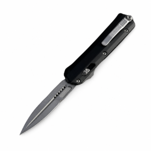 4 inch black switchblade on white background